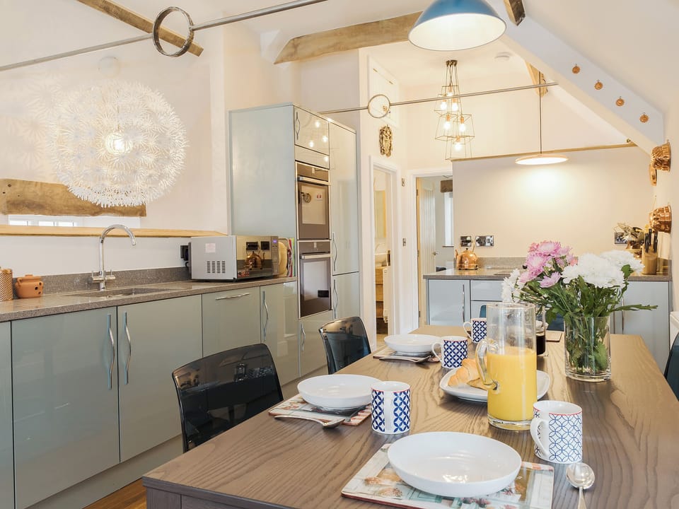 Well equipped kitchen/ dining area | Stone Barn - Vicarage Road Holiday Cottages, Minehead
