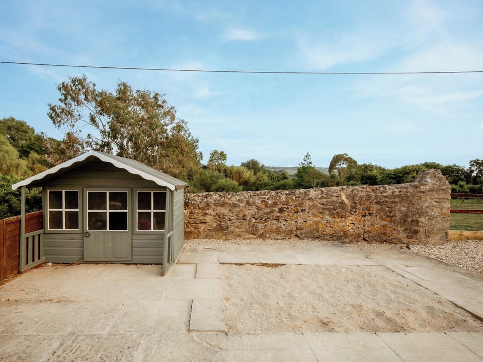 Outdoor area | Orchard Cottage - Rudge Farm Cottages, Chilcombe, near Bridport