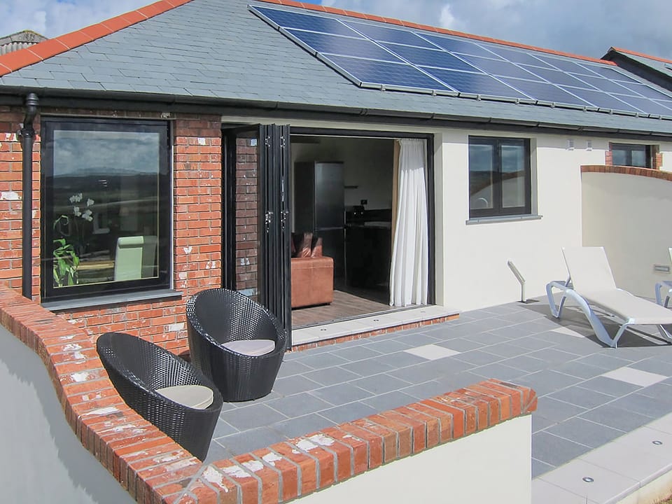 Lovely sunny patio | Shooting Star - Wooldown Holiday Cottages, Marhamchurch, near Bude