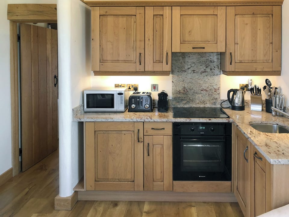 Well equipped kitchen area | Wenna&rsquo;s Well - Wooldown Holiday Cottages, Marhamchurch, near Bude