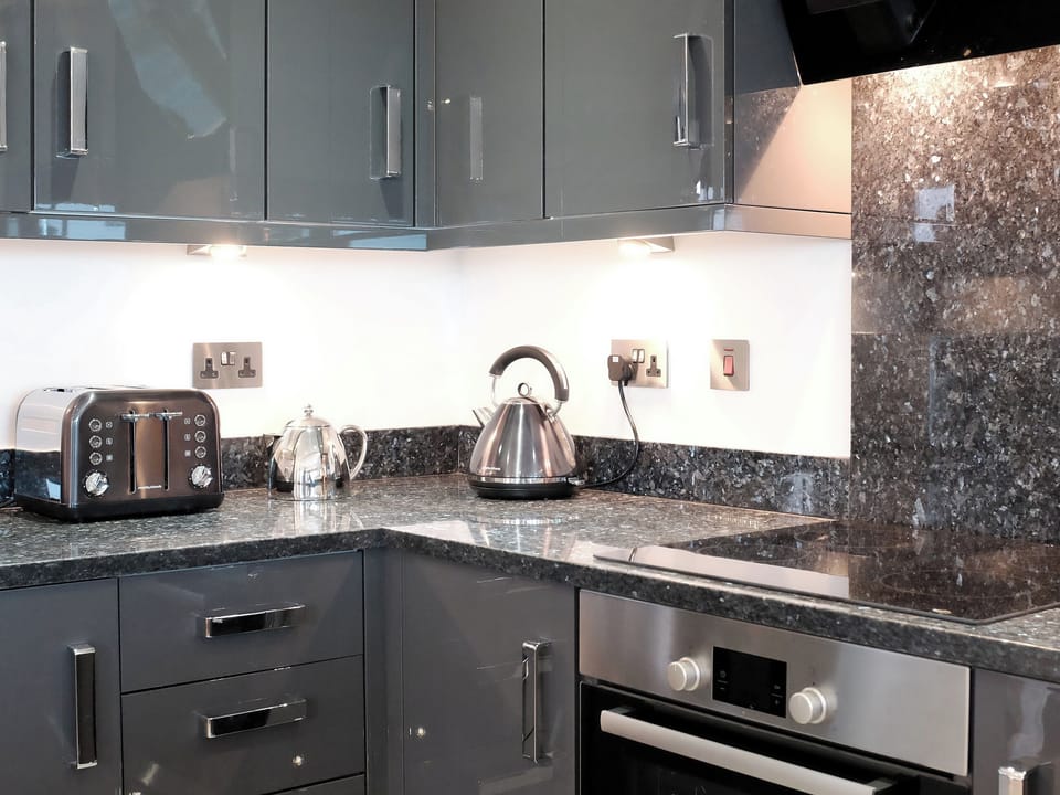 Contemporary kitchen area | Bijou - Wooldown Holiday Cottages, Marhamchurch, near Bude
