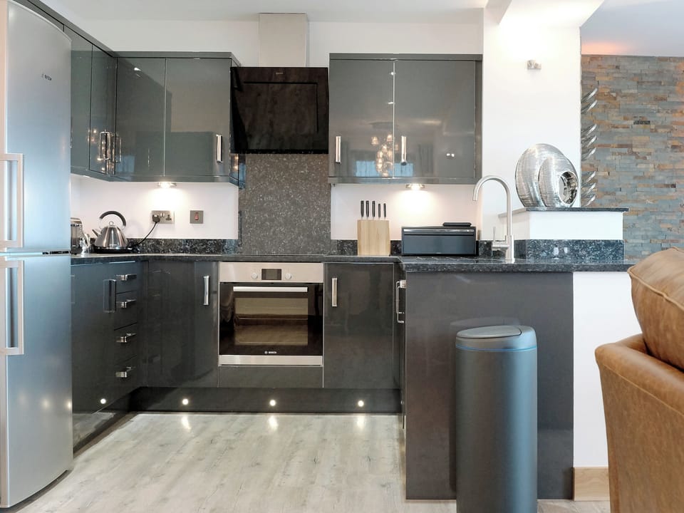 Well presented kitchen area | Bijou - Wooldown Holiday Cottages, Marhamchurch, near Bude