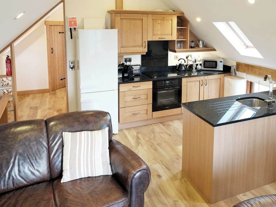 Open plan styled living/ kitchen | Corn Keep - Wooldown Holiday Cottages, Marhamchurch, near Bude