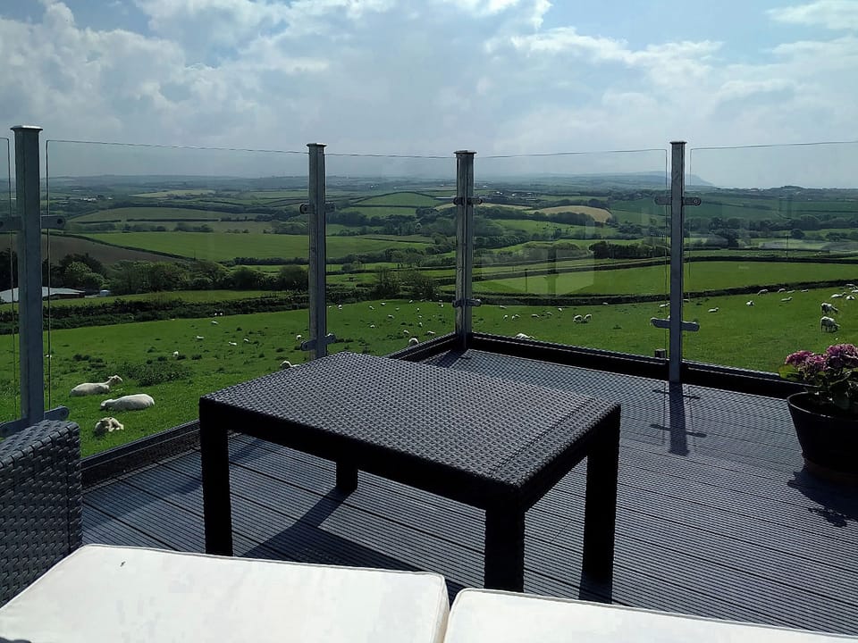 Wonderful far reaching view from your own private balcony | Corn Keep - Wooldown Holiday Cottages, Marhamchurch, near Bude