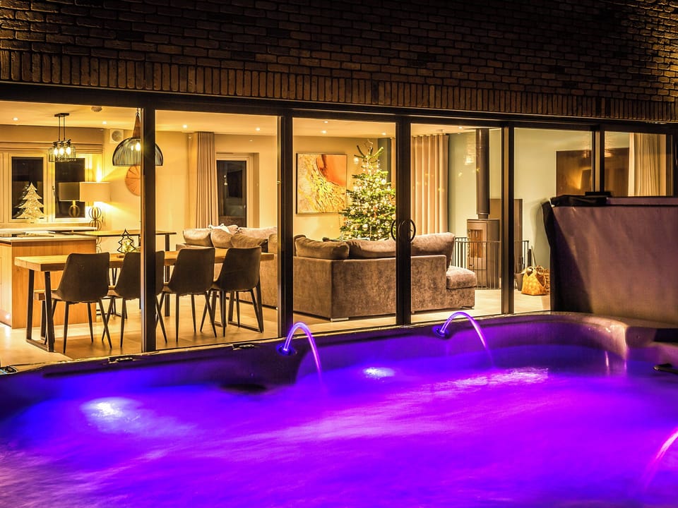 Bifold doors to hot tub and garden | The Elms - Ashlin Farm Barns, Dunholme, near Lincoln