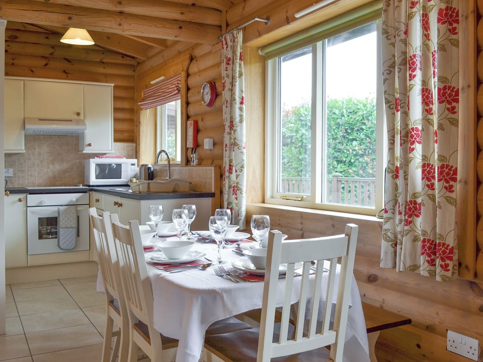 Convenient dining area and well-equipped kitchen | Pheasant Lodge - Mackinder Farms, Brayton, Selby