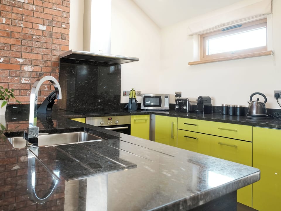 Modern, well-appointed kitchen | Moonshine - Wooldown Holiday Cottages, Marhamchurch, near Bude