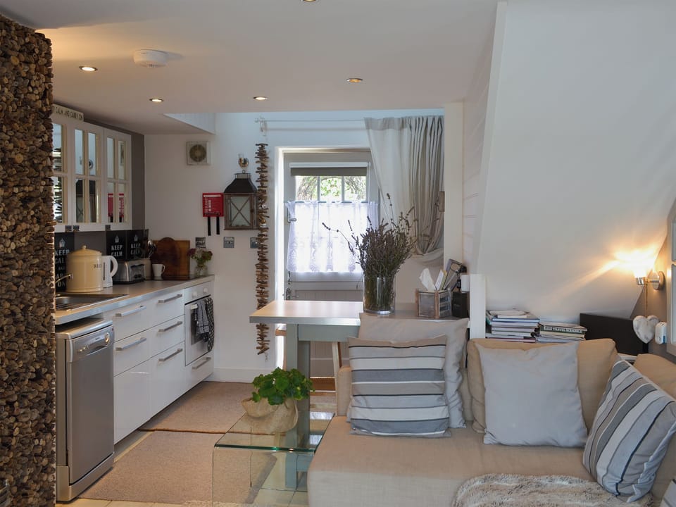 Kitchen with breakfast bar | The Nest - Cheshire Boutique Barns, Wrenbury, near Nantwich