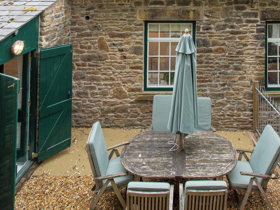 Sitting-out-area | The Old Workshop - Lowes Mill Cottages at Torr Vale Mill, New Mills