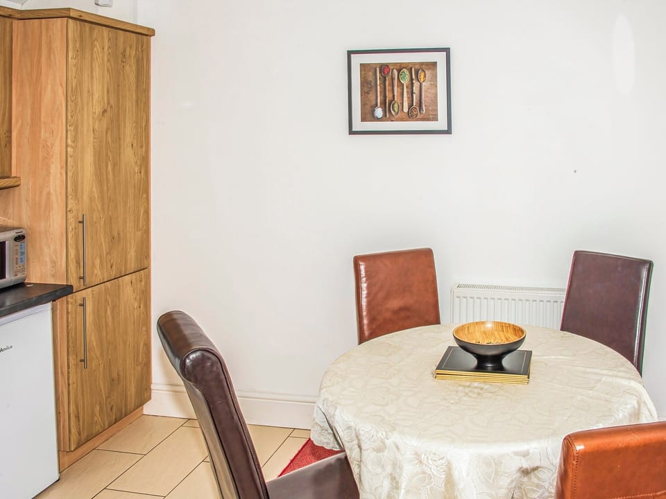 Kitchen/diner | Apartment 5 - Cosy Llandudno Apartments, Llandudno