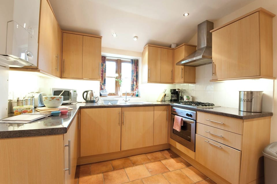 Kitchen area | Fistral Cottage - Carnebo Holiday Barns, Perranporth