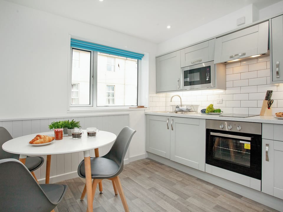 Kitchen/diner | Seagulls Rest - Sunnybeach Holiday Apartments, Paignton