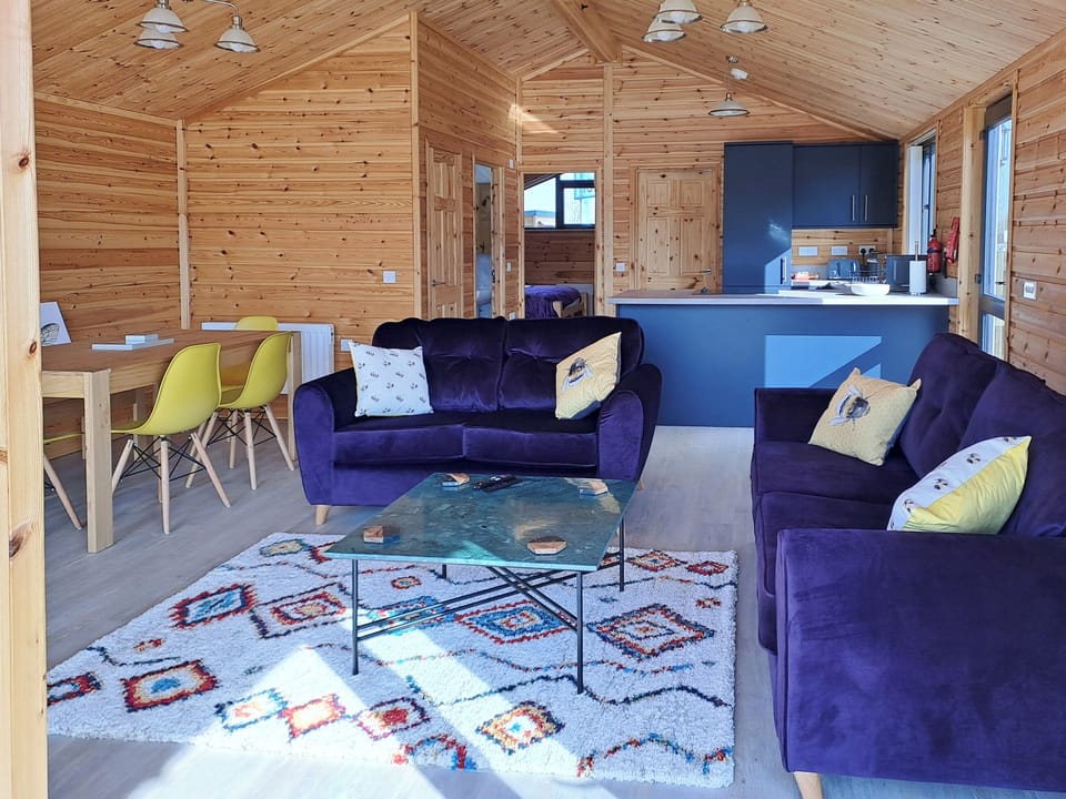 Living room/dining room | Nature&rsquo;s Nook - Norfolk Holiday Lodges, Brundall