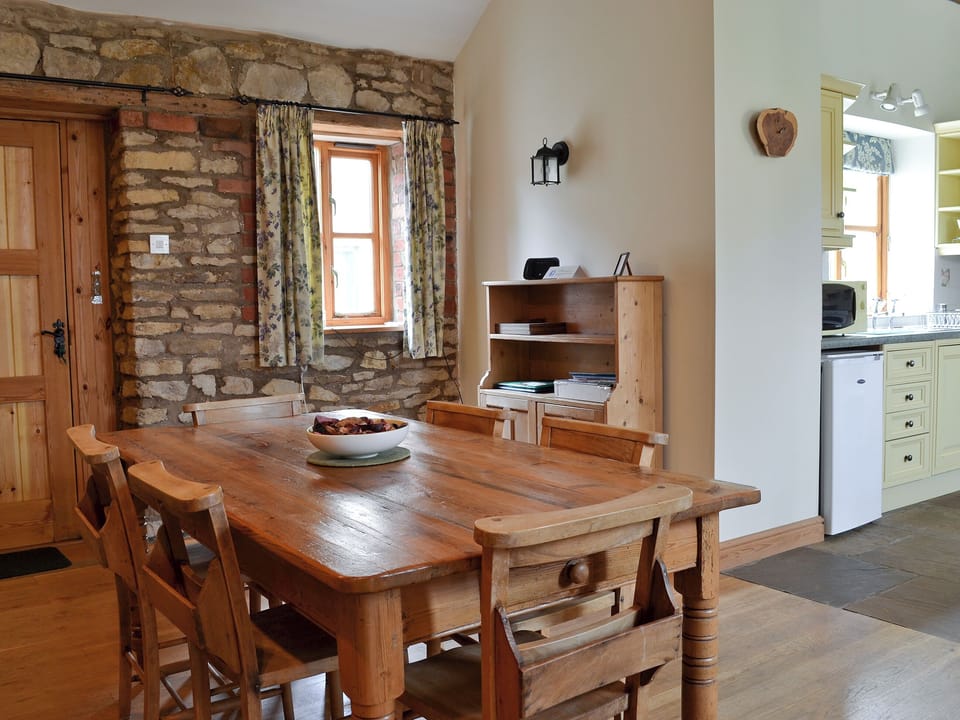 Dining area | The Stables - Home Farm Holiday Cottages, Slingsby, near Malton