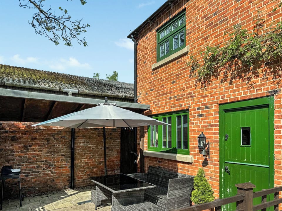 Sitting-out-area | Piper Cottage - The Carriage House, Bilbrough, near York