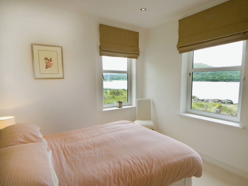 Double bedroom with views across the loch | Tigh Beg Croft, Lerags, near Oban