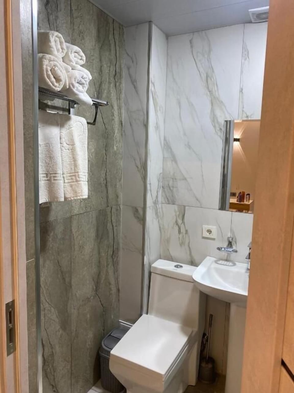 Shower, free toiletries, hair dryer, slippers