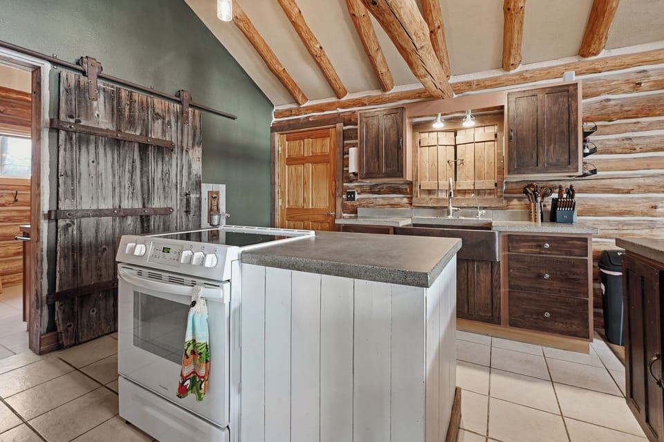 Fully equipped kitchen with cozy cabin feel