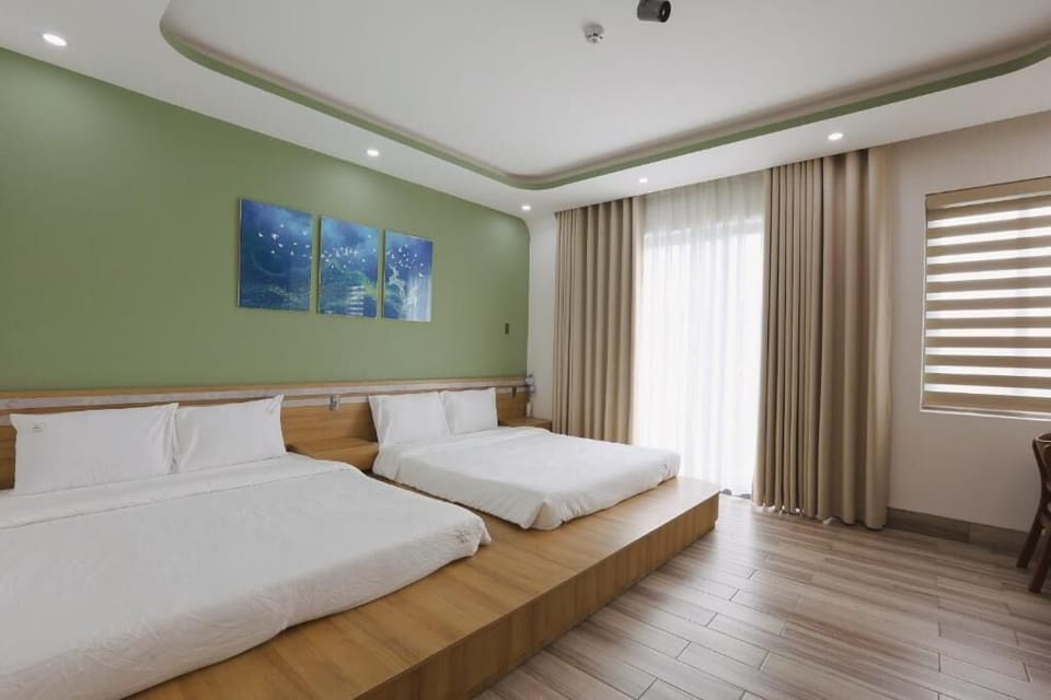 Family Quadruple Room, City View | Desk, iron/ironing board, free WiFi