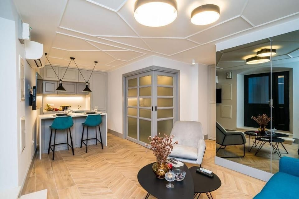Apartment | Living area | 80-cm LCD TV with cable channels
