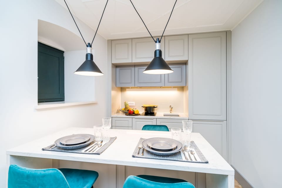 Apartment | Private kitchen | Espresso maker, electric kettle, dining tables