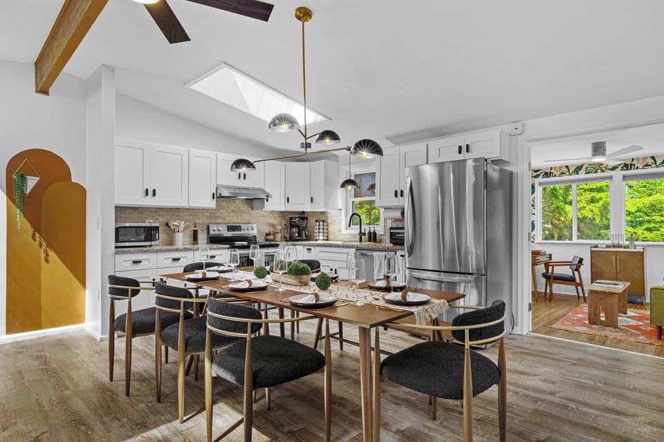 Open-concept dining and kitchen make it easy to cook, connect, and share meals together.