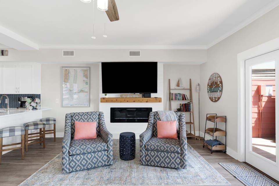 A flatscreen TV and extra seating available for spreading out