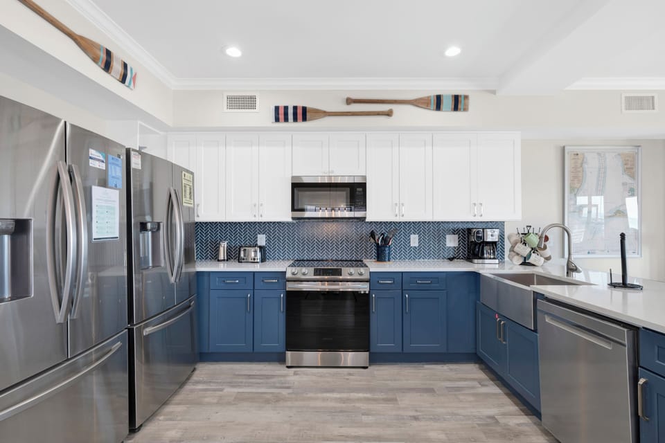 The kitchen is fully equipped for all of your cooking needs and provides stainless appliances and stone counters