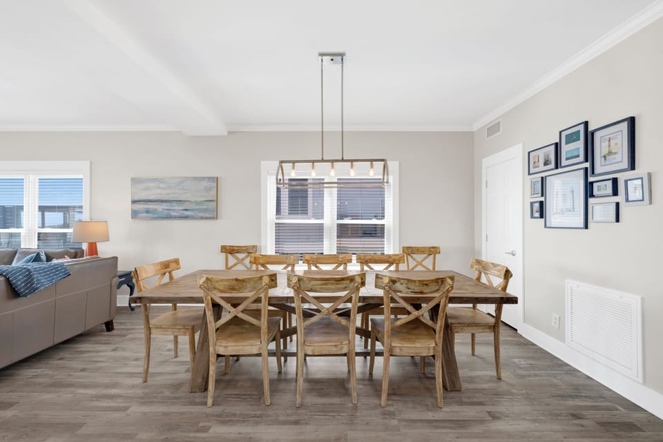 Gather around the dining table that can comfortably seat up to 10 guests