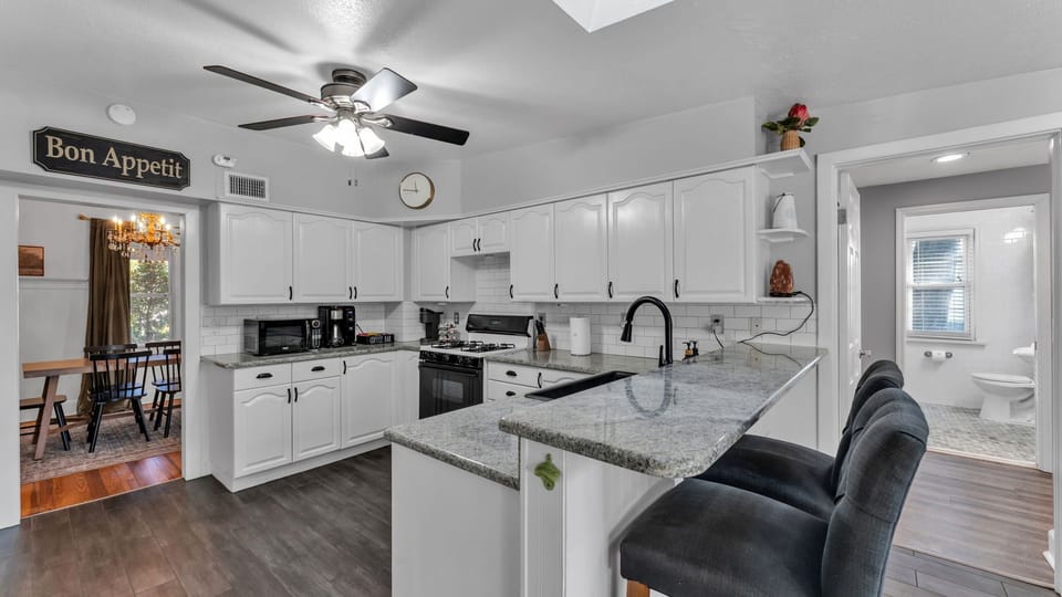 Fully equipped kitchen featuring a rare gas stove, Keurig & espresso machine, plenty of counter space, and all the essentials needed to cook with ease.
