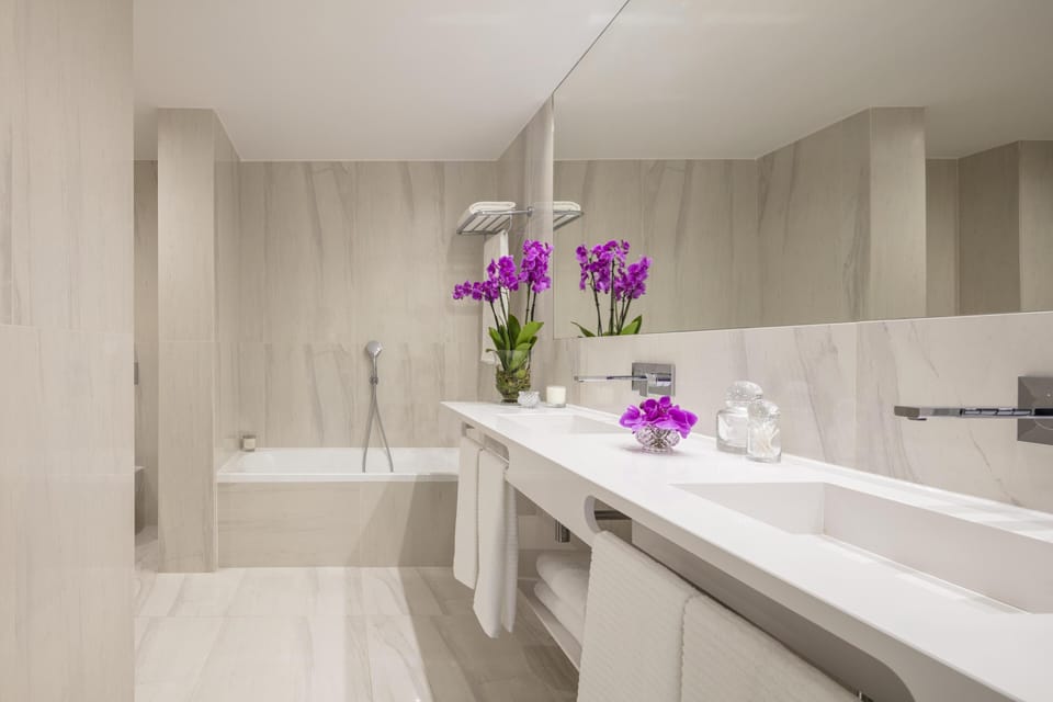 Eco-friendly toiletries, hair dryer, bathrobes, slippers