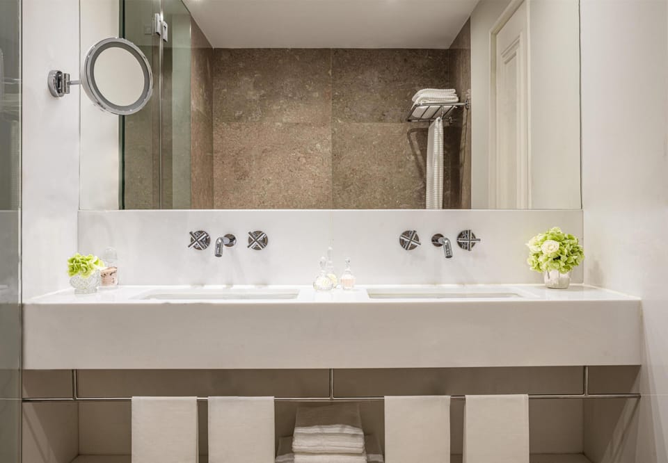 Eco-friendly toiletries, hair dryer, bathrobes, slippers