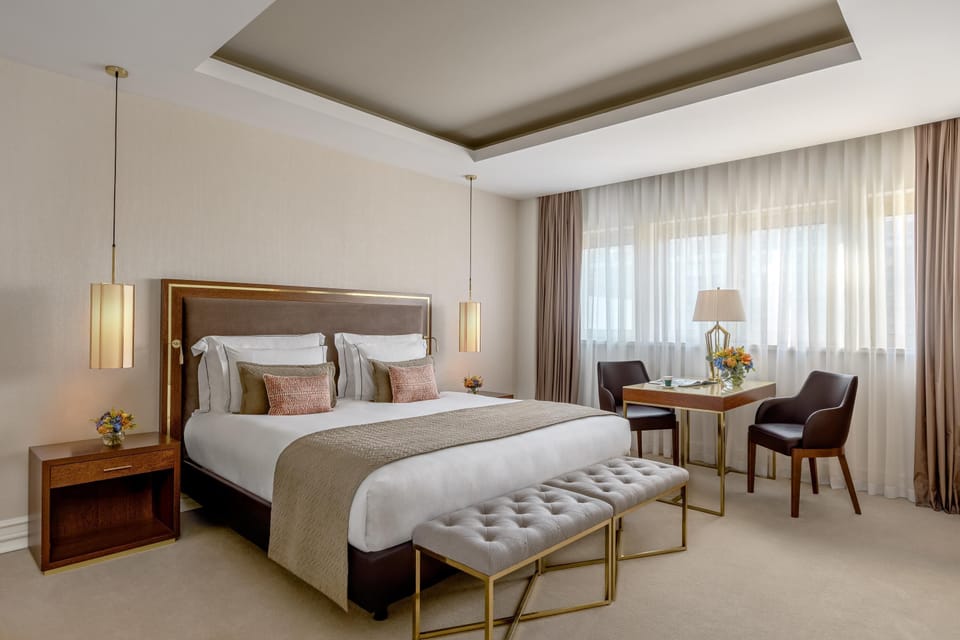 Hypo-allergenic bedding, down comforters, minibar, in-room safe
