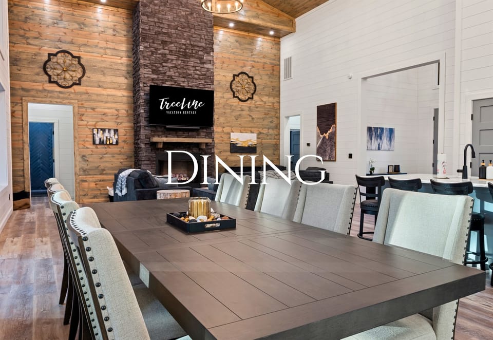 The large dining table invites the whole group to gather together for shared meals, game nights, or long conversations.