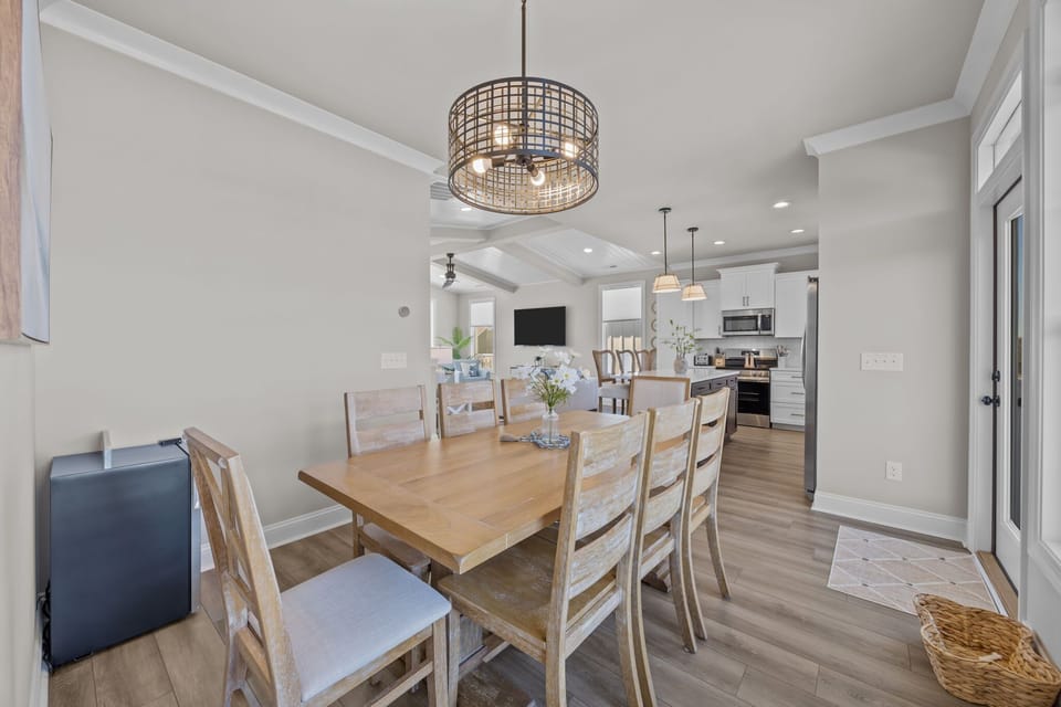 Top Level Dining Area w/ Deck Access, and Kitchen Area