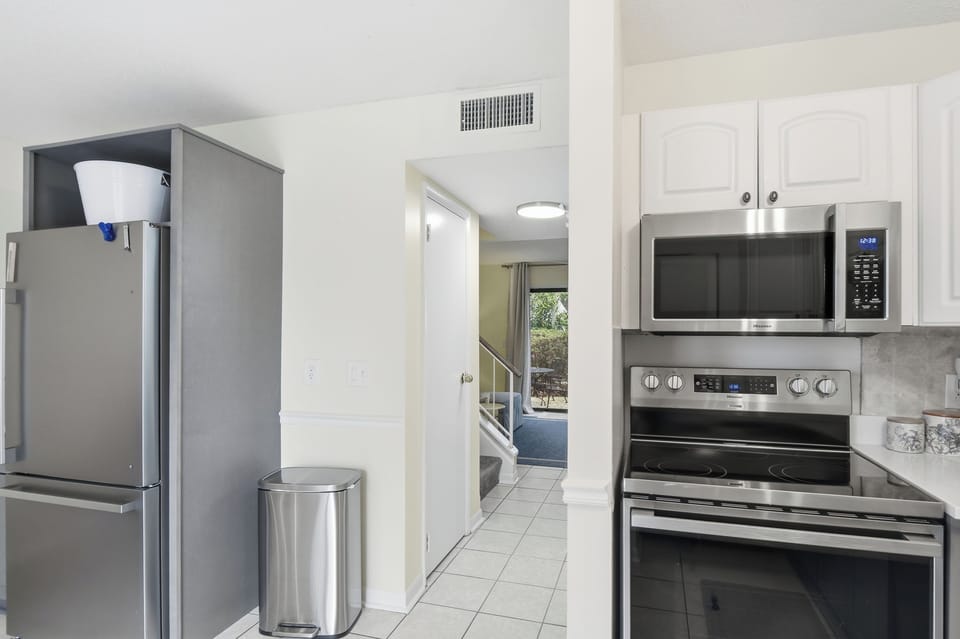 Your fully equipped kitchen features stainless steel appliances and modern conveniences for effortless meal preparation during your stay.