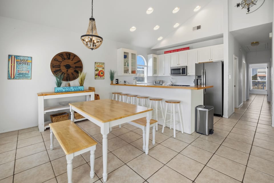Cozy dining space for shared meals, game nights, or planning you - Cozy dining space for shared meals, game nights, or planning your next beach day