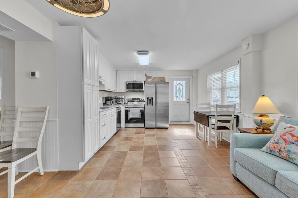 Your bright, open-concept space seamlessly blends kitchen and living areas, perfect for cooking meals and relaxing together.