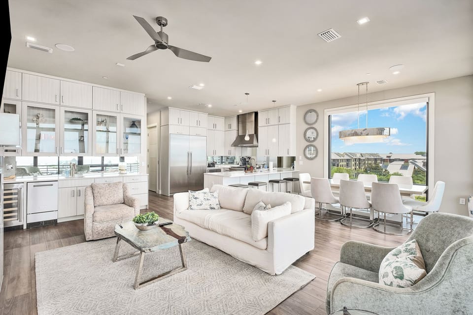 Gather, relax, and entertain in this stunning coastal retreat featuring a gourmet kitchen and spacious living area.