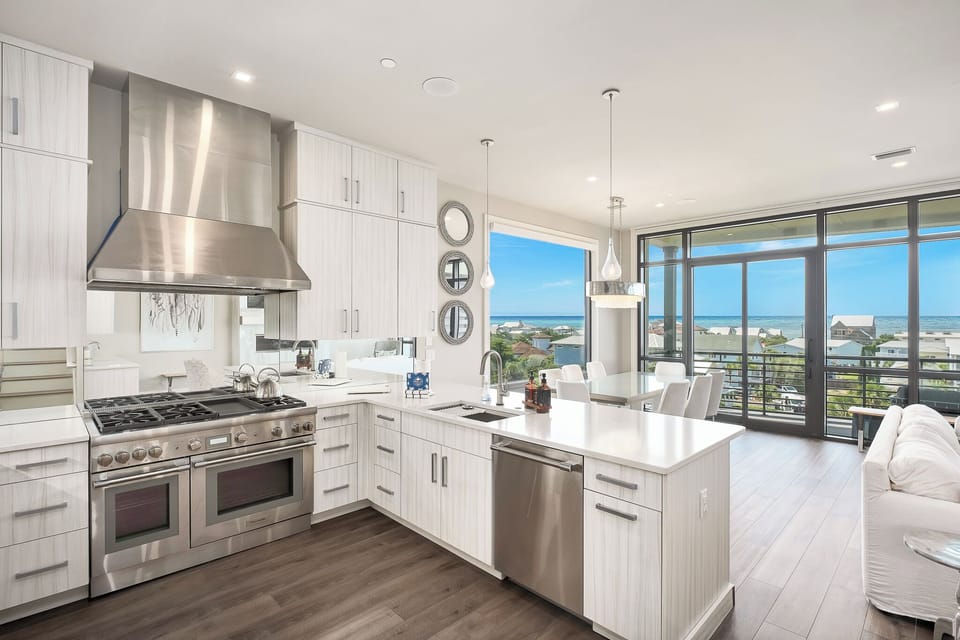 Bright, open-concept living with designer finishes, floor-to-ceiling windows, and breathtaking Gulf views.