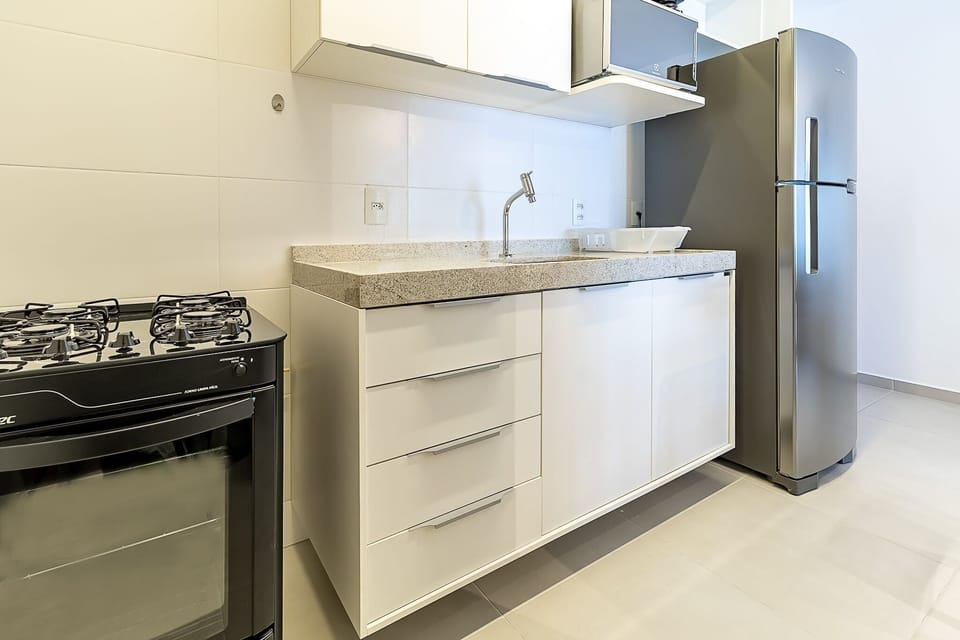 Apartment | Private kitchen | Cookware/dishes/utensils, cleaning supplies, dining tables