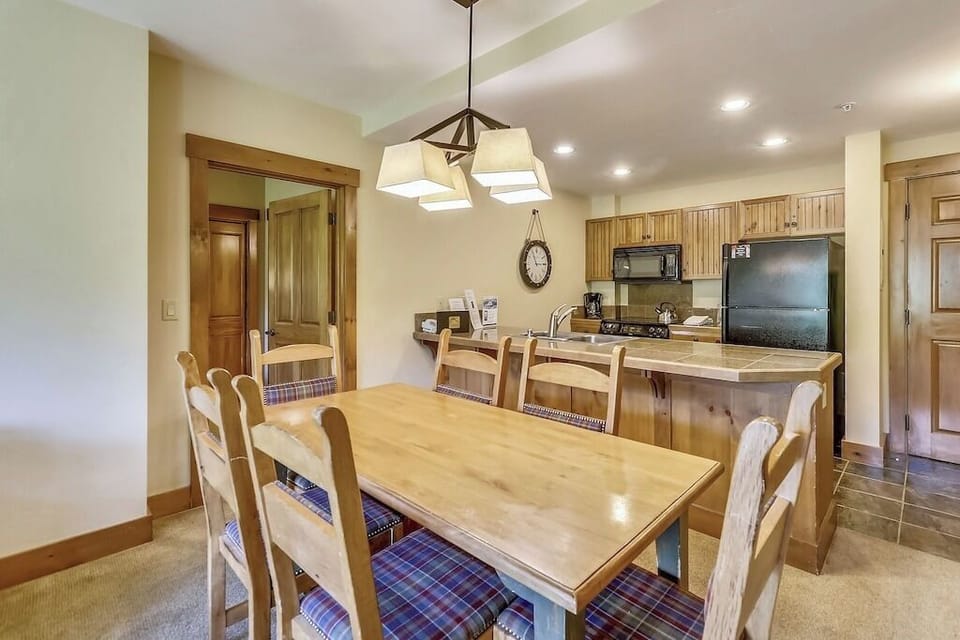 Gather around this welcoming dining space where your group can share meals and create memories together in comfort.