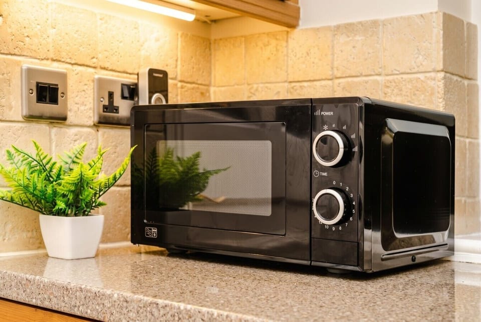 Microwave on hand for quick and easy meals in the kitchen