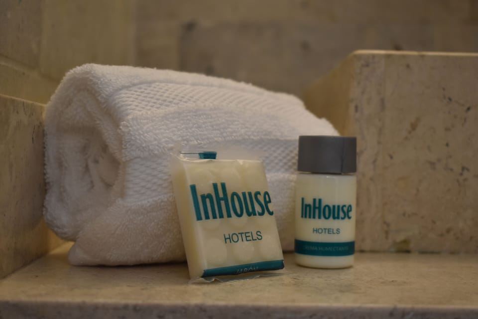 Standard Room, 2 Double Beds | Bathroom amenities | Shower, hair dryer, towels, soap