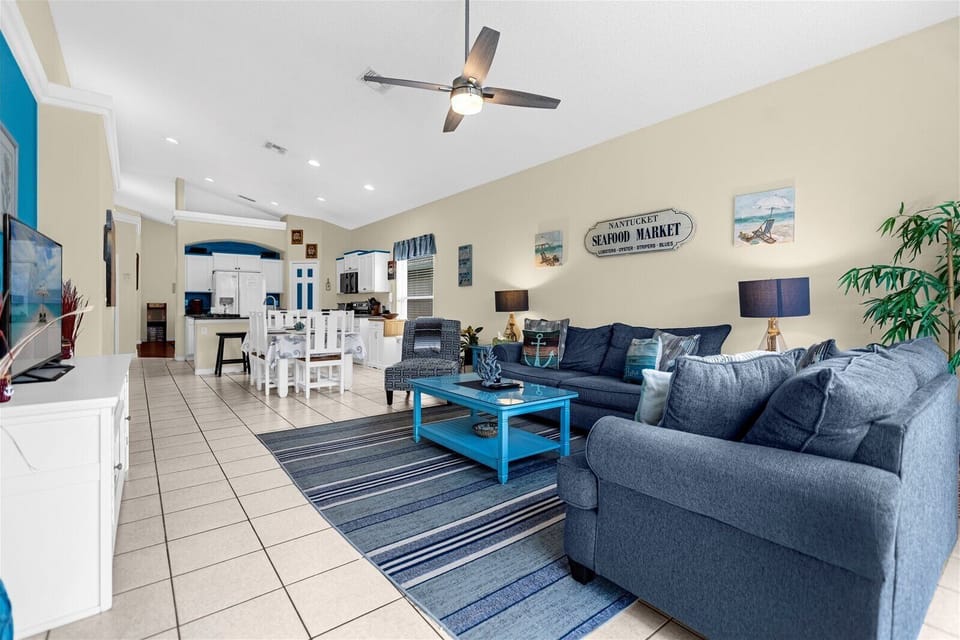 Back Living Room With TV And Kitchen View