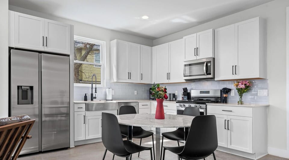 Crisp cabinetry, pro-grade range, and room to create.