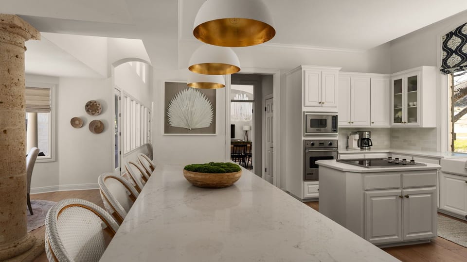A great spot for morning coffee, snacks, or chatting while the chef works in the kitchen.
