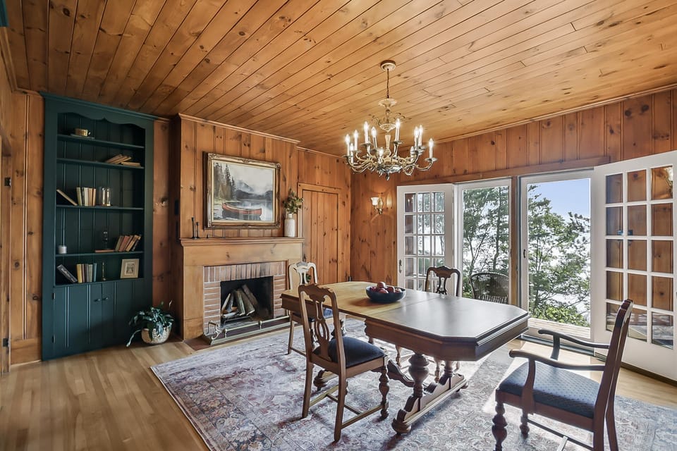 Cozy dining room with rustic charm and scenic views
