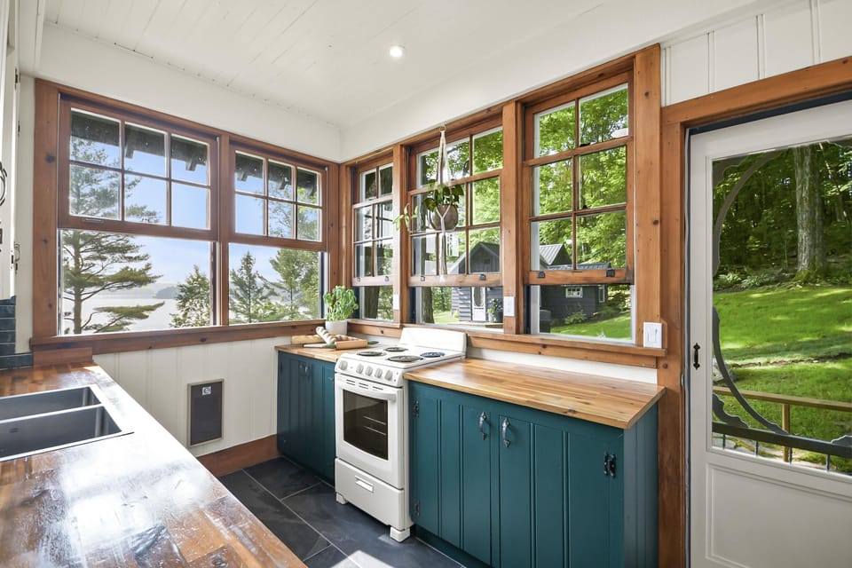 Cozy kitchen with scenic garden views and natural light