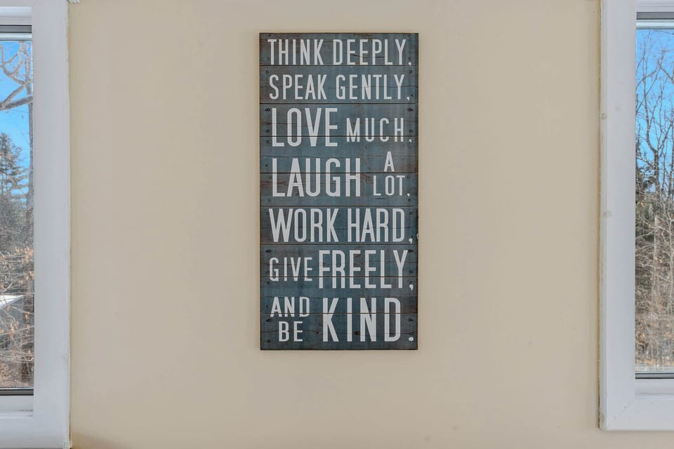 Inspirational wall art in the sun room